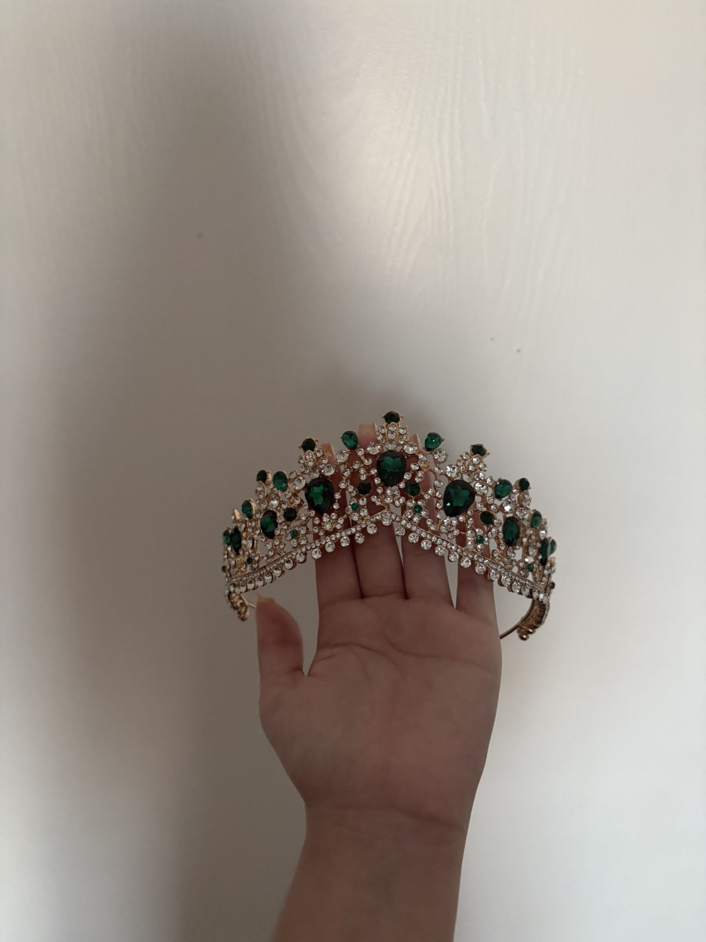 curved emerald green tiara