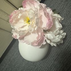 Fake flowers in ceramic pot
