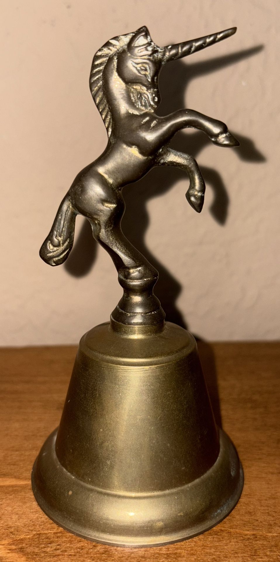 Vintage brass unicorn bell