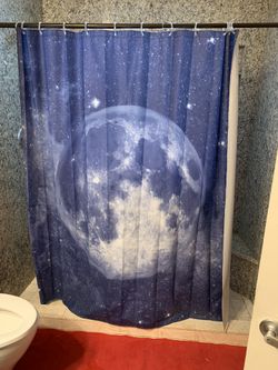 Space themed shower curtain like new with shower curtain rings