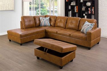 Ginger Leather Sectional And Ottoman 