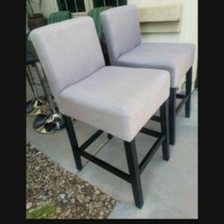 2 Bar Stools Excellent Condition  Fabric Grey 26" From The Seat To The Floor 