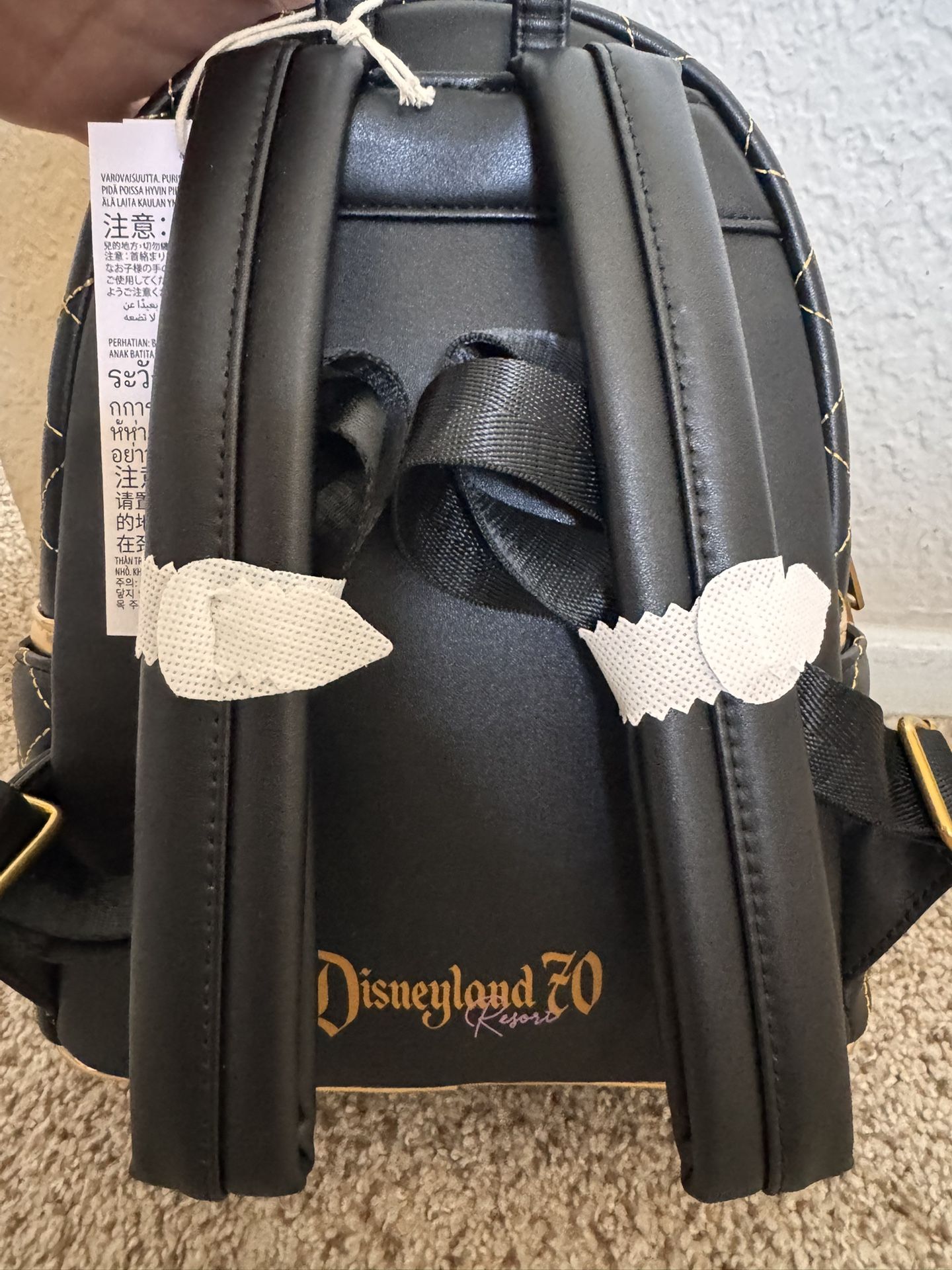 Disneyland 70 Quilted Black Mini Backpack with Gold Accents Sleeping Beauty Amazon.com: Disney Sleeping Beauty Spinning Wheel Mini  main image 2