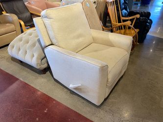 Cream Colored Swivel Recliner