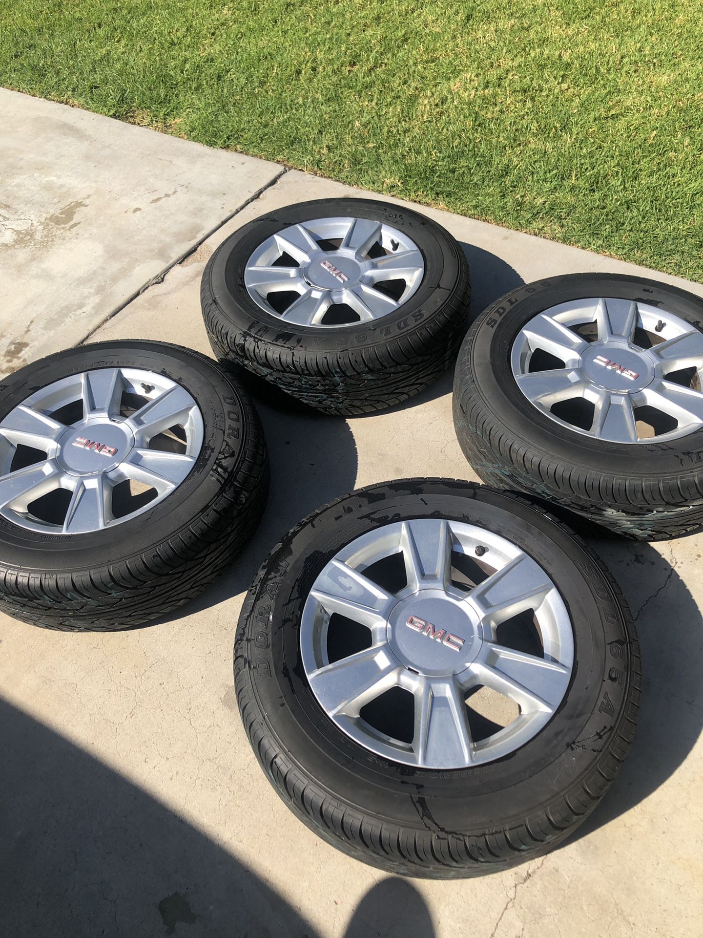 4 Doral 225/65R17 1025 tires with GMC rims