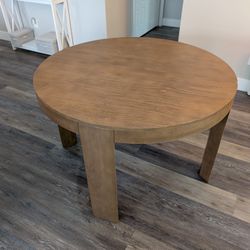47" Round Wooden Table From Plank+Beam