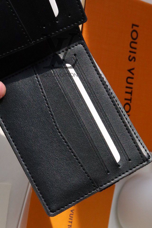 Louis Vuitton x Human Made Black Wallet M81020 11x8.5cm for Sale