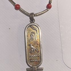 18”  silver with red coral beads necklace with a nice toned Egyptian pendant