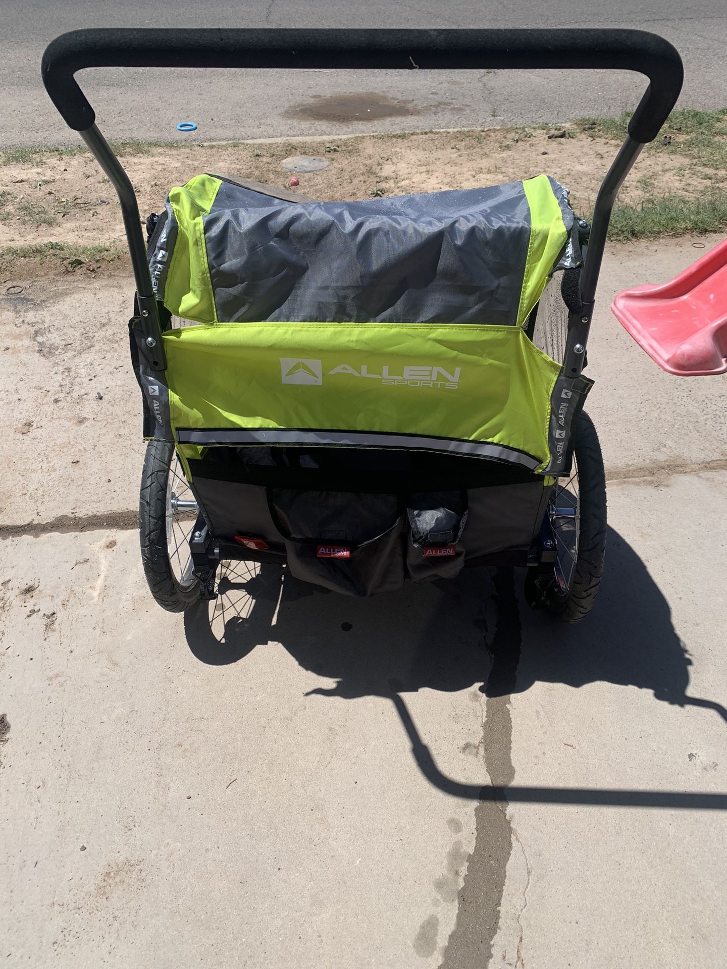 I Allen Sports Deluxe 2-Child Bicycle Trailer & Stroller, max capacity 100 lbs,