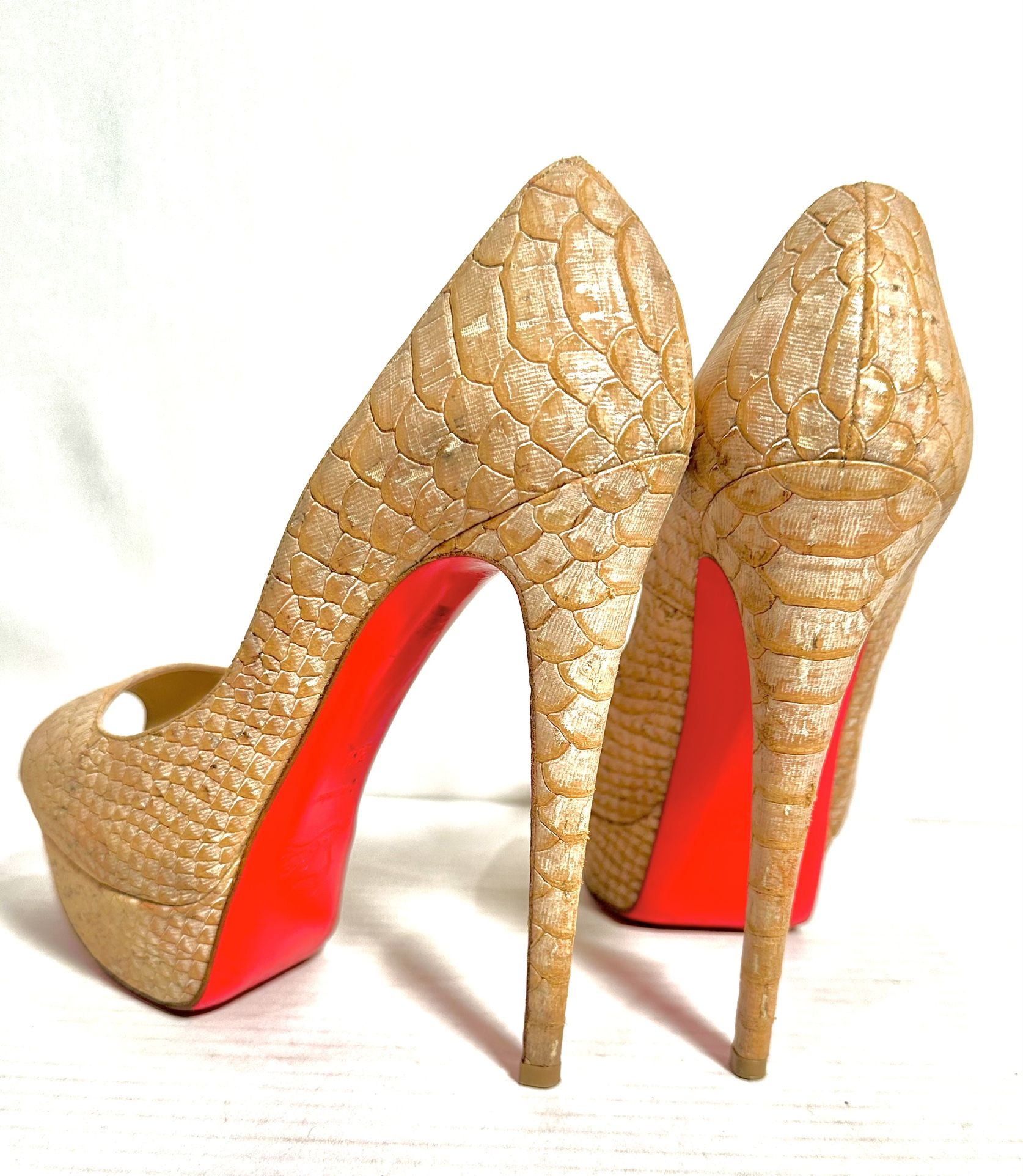 CHRISTIAN LOUBOUTIN HEELS