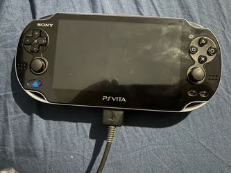 Psvita with game and charger