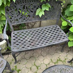 Metal patio loveseat, and two chairs