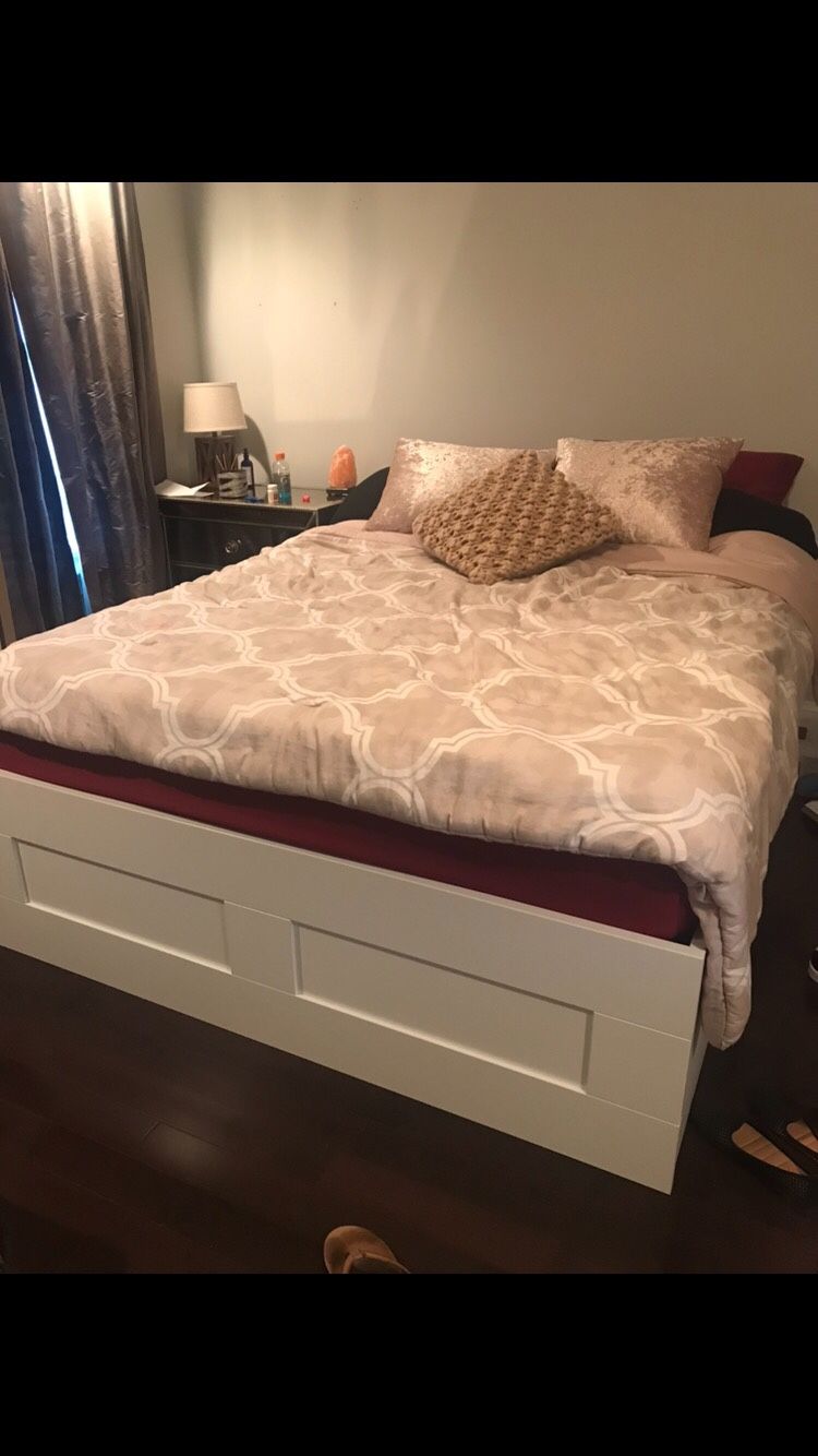 Full sized bed with shelving