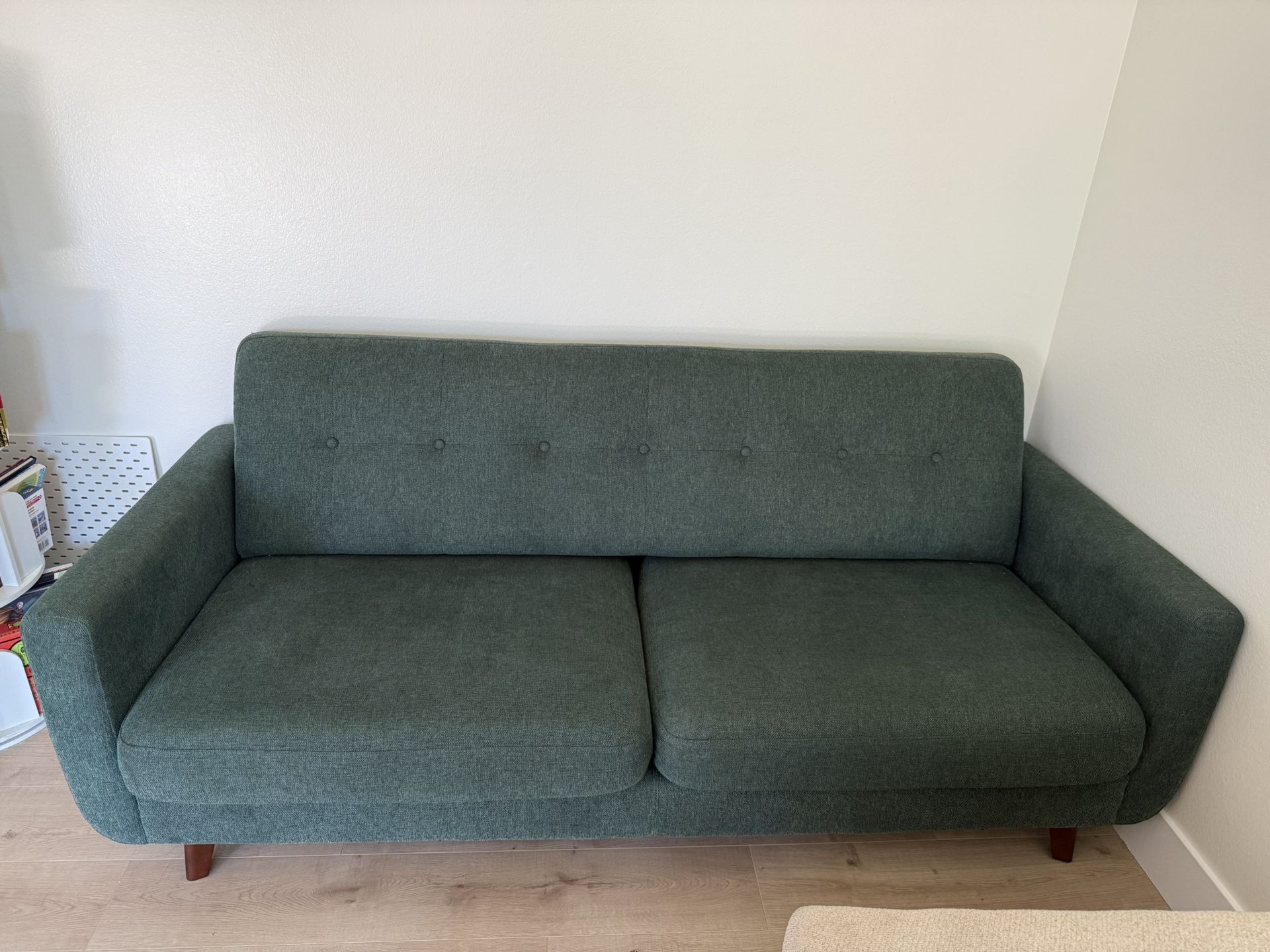 Green mid-century modern sofa