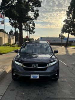 2021 Honda Pilot · Touring Sport Utility 4D