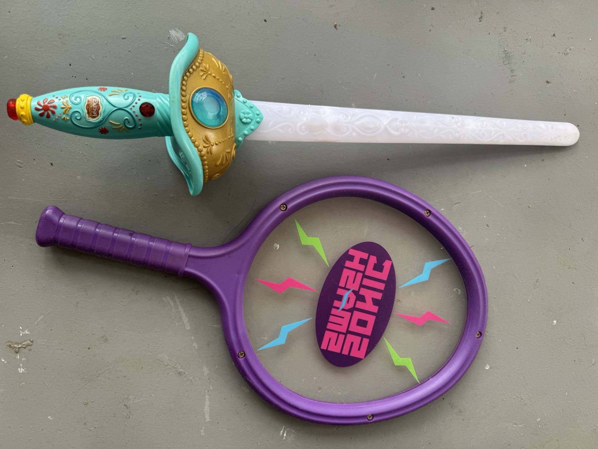 Lot Of Two: A Blur Sword And  Paddle Racket 