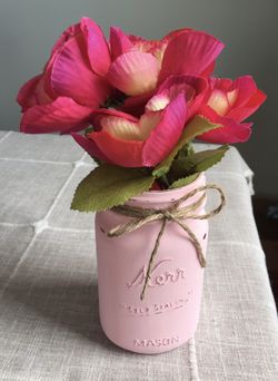 Distressed mason jar vase with silk flowers