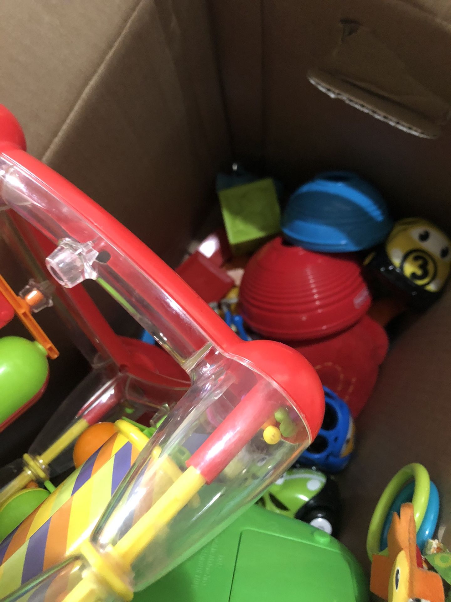 box of baby/toddler toys