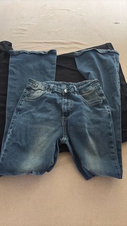 blue small bootcut jeans with crosses on back pockets
