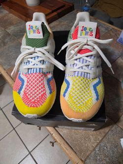 the Adidas Ultraboost 5.0 DNA "Love Unites" Pride edition, featuring a vibrant, patchwork-inspired multi-color Primeknit upper. 9 men size