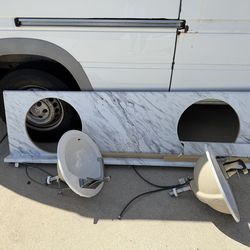 Double vanity - with sinks and faucets. Laminate top
