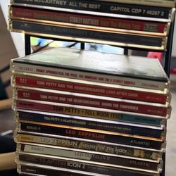 CDs Rock N Roll / DVDs All Kinds. 