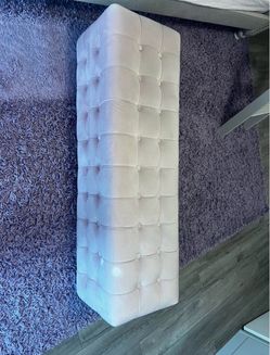 Soft tufted bench. Pretty pink/blush color. Velvet-like material with button details. Measures approx 47 inches long and 16 inches wide. Good for extr