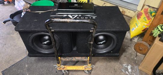 Skar audio dual 12s 1600 watts a piece and 3000watt db drive amp