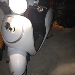 2 Honda Metropolitan Scooters