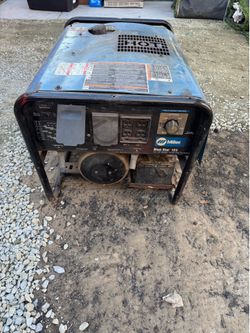 Miller 185 blue star welding machine and generator