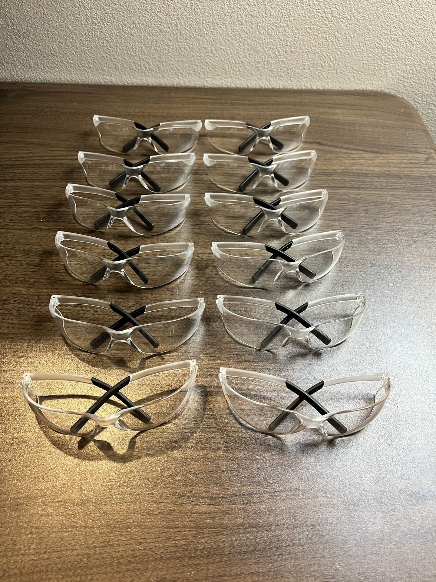12 Pair Safety Glasses (used Lightly)