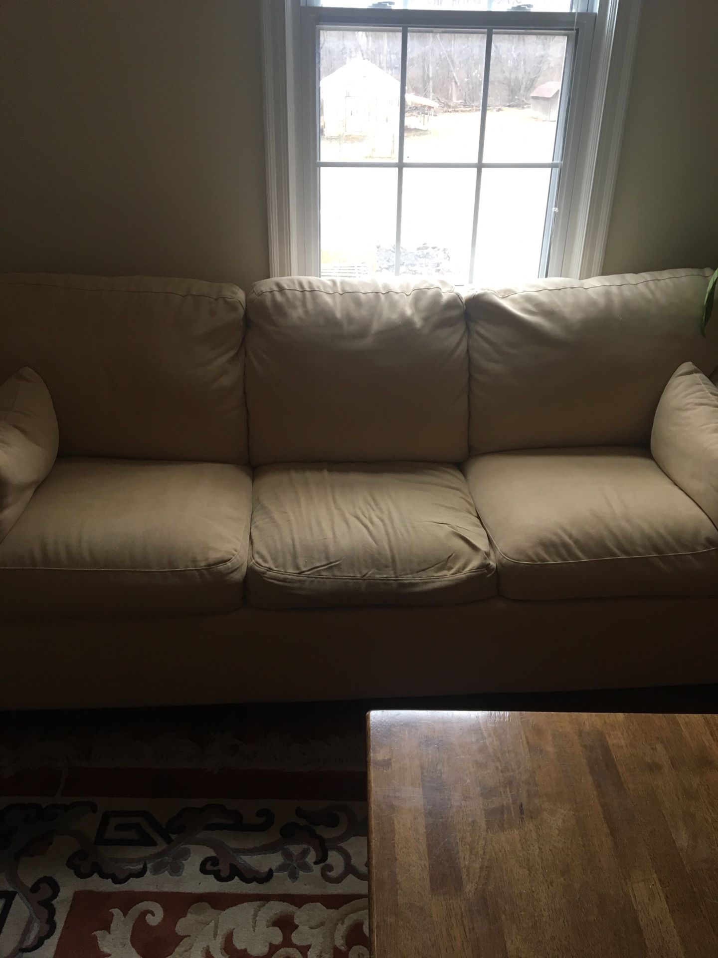 Soft yellow sleeper couch