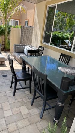 Pottery barn table with glass