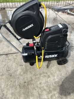 8 Gallon Husky Air Compressor & husky Hose Reel. FOR SALE!!!