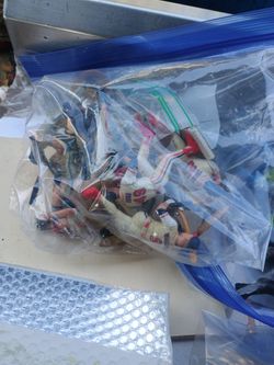 Assorted action figures gi joe xmen wwf starting lineup MLB marvel as seen in pictures  as is.