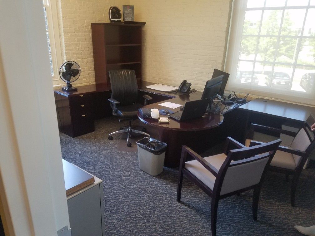 Office set a big brown desk two chairs