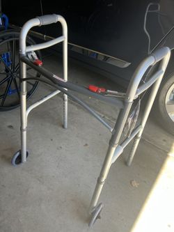 Barely Use Drive Medical Deluxe 2-Button Folding Walker with Wheels