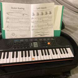 Piano with Carrying Case 