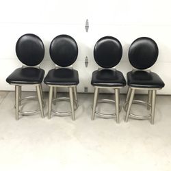 SET OF 4 MATCHING BLACK VINYL BAR / COUNTER HIGHT STOOLS