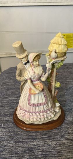 Victorian Couple With Bird House