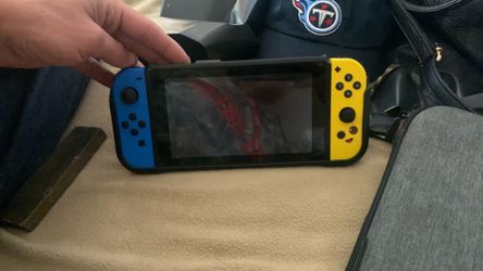 Nintendo switch with case and cover.