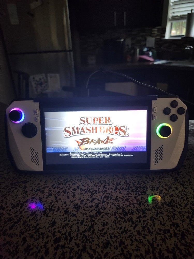 ROG ALLY Z1 EXTREME, W SKULL & CO GRIP, AND A CARRY CASE