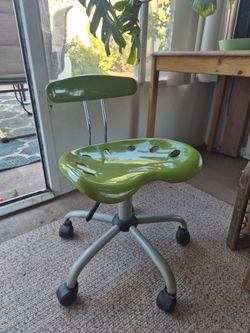 Super cute green stool!