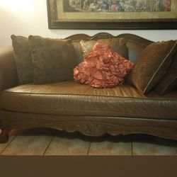 Leather Chesterfield Sofa and LoveSeat for sale. Impeccable. Stylish.