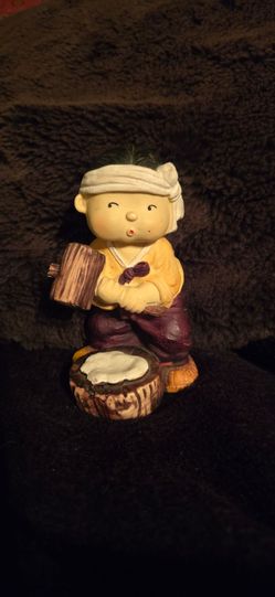 Vintage Asian Boy Figurine with Wooden Mallet