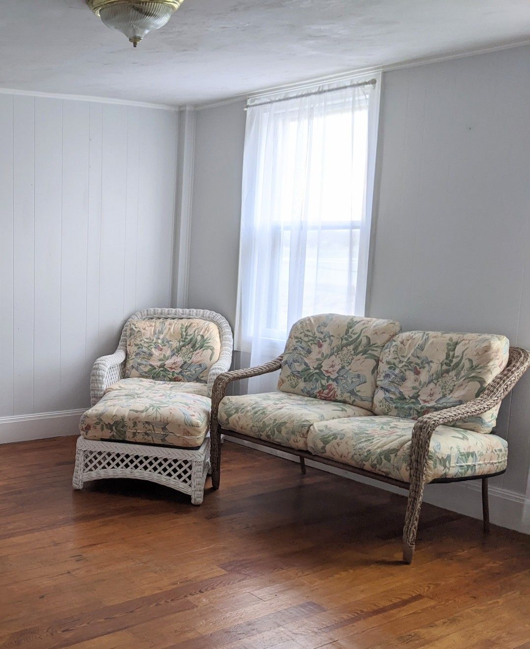 Vintage White Wicker Chair and Ottoman with Tan Wicker Loveseat and Floral Cushions