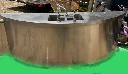 curved stainless steel mobile bar with integrated sink