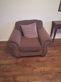 Brown couch and armchair
