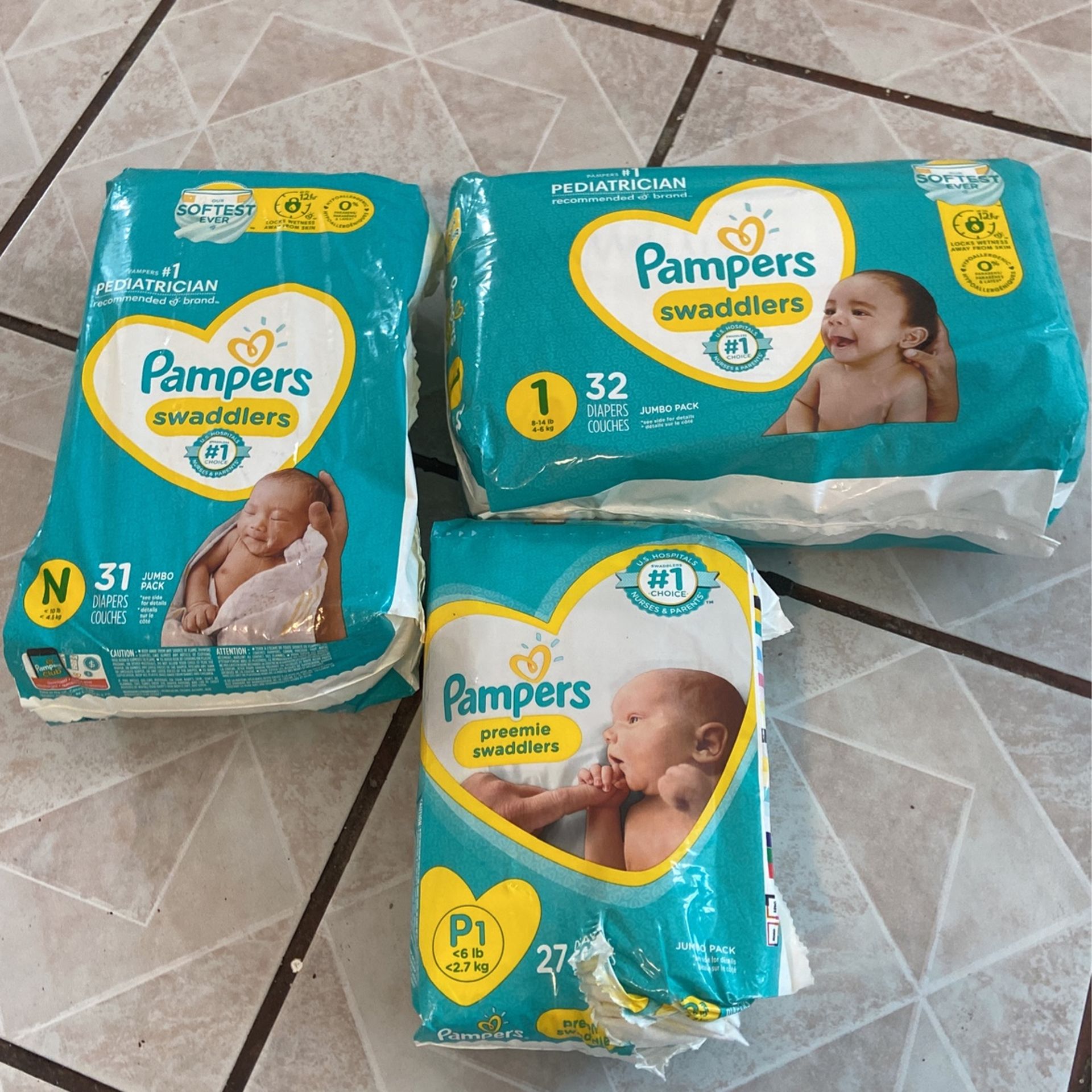 “PAMPERS” brand diapers 3 different sizes