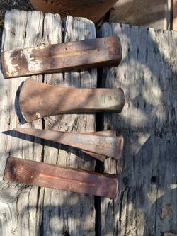 Vintage log splitting wedges